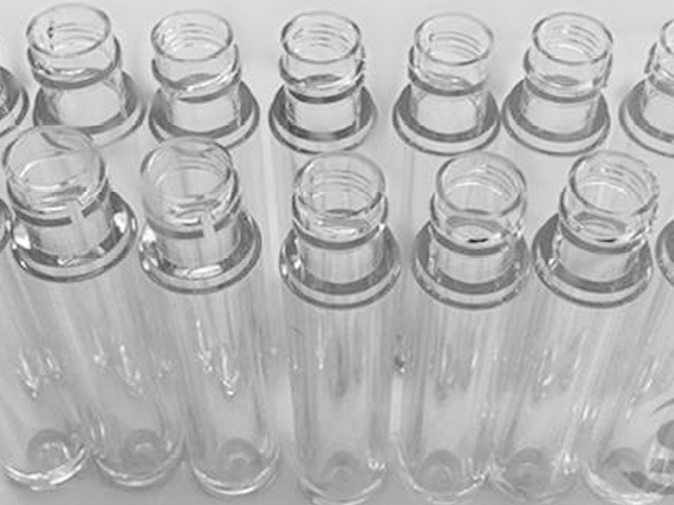 Cosmetics (lip gloss bottles)